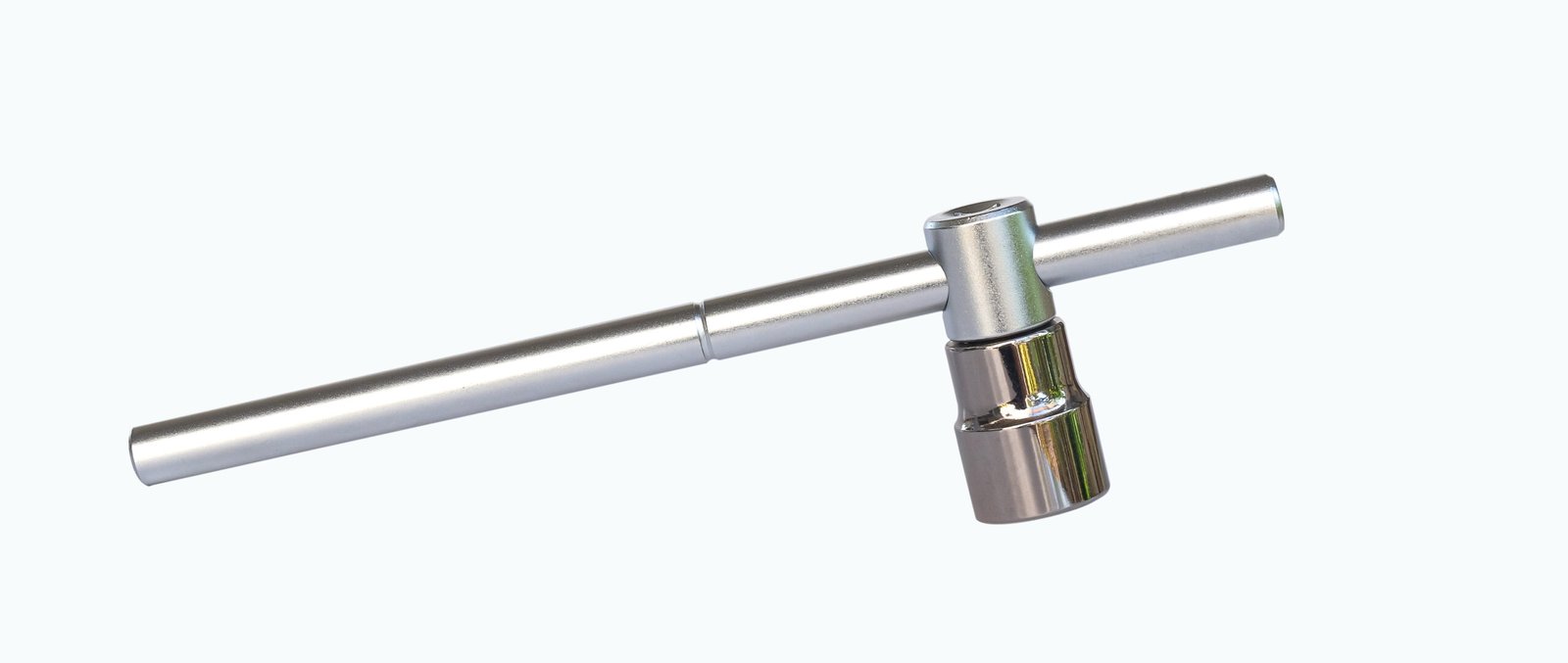 Metal tool with a socket attachment for fastening.