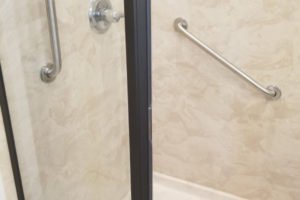 Accessible shower with safety grab bars